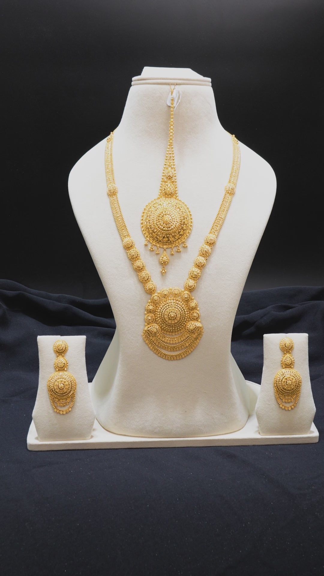 Video showcasing the Iconic 22K Gold Ranihaar Necklace with intricate traditional designs, perfect for weddings and cultural events.